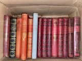 a box full of books that are sitting on a shelf