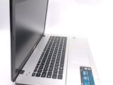 a laptop computer that is sitting on a table
