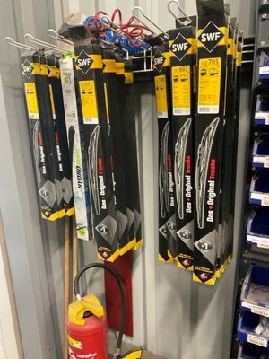 many different types of vacuum cleaners in this store