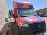a van that is parked on the side of the street