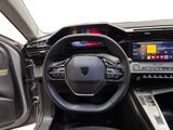 the interior of a car with a steering wheel and dashboard controls