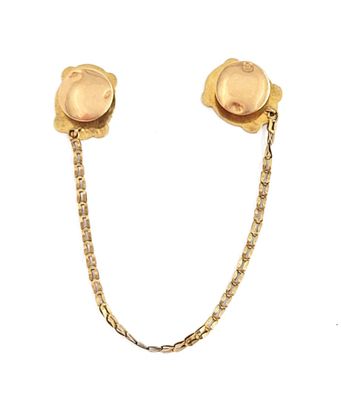 pair of gold tone earrings with chain and flower design
