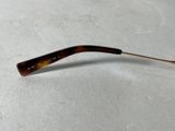 an image of a pair of glasses laying on a table