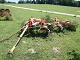 an image of a tractor and a plow in a field