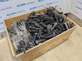 a wooden box filled with lots of different types of screws