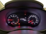 a close up of a car dashboard with a speedometer and gauges