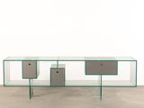 an image of a glass table with two drawers on top of it