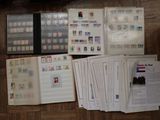 many different types of stamps on the pages of a book