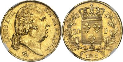 a gold sovereign coin with a crown on top of it