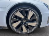 a close up view of a car ' s wheels and rims