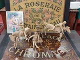 a lot of figurines that are sitting on a table