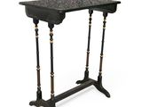 a black table with a marble top and two legs