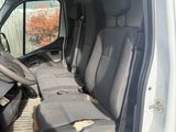 the inside of a van with the seats folded down and the driver ' s seat folded down