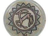 a picture of a decorative plate with a stylized design on it