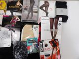 many pairs of tights and stockings on the table