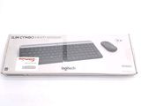 a box with a keyboard and mouse inside of it