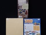 a box with a game on it next to a package