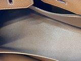 a close up of a purse with a strap on it