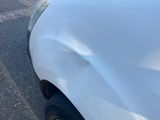 a picture of a car that has been badly damaged