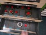 a person that is playing a video game on the train