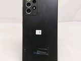 a close up of the back of a black samsung galaxy s20