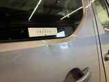 a car that has a sticker on the side of it