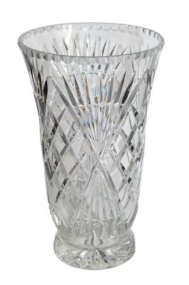 a glass vase that is sitting on a white surface