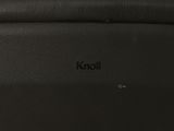 a close up of a black bag with a handle on it