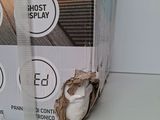 a cardboard box with a picture of a cat inside of it