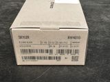 boxed box on a table with a barcode on the side