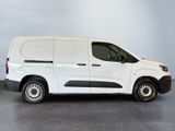 a picture of a white van parked in a garage