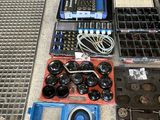 a lot of tools that are sitting on the floor