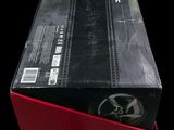 a black box with a red lid on a black background