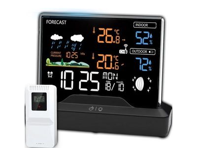 un réveil surmonté d'une station météo