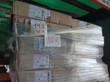 a large stack of boxes that are stacked on top of each other
