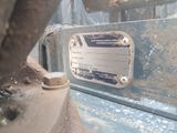 a close up of a metal plate on a machine