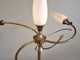 a chandelier with three lights hanging from the ceiling