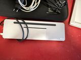 a laptop and a mouse on a table with a mouse pad