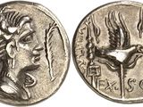 a silver coin with an image of a woman and a bird on it