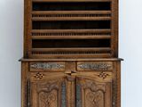 an old wooden cabinet with two drawers and a door