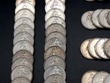 a lot of coins that are on a table