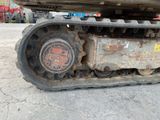 an image of a close up view of a tractor track