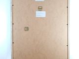 a picture of a brown box with a sticker on it
