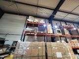 a large amount of boxes on the shelves in the warehouse