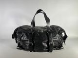 black leather duffel bag on a white background