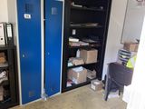 a blue locker in the corner of a room next to a desk