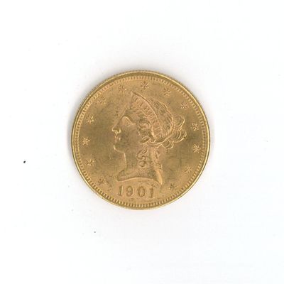 une pièce d'or avec l'image d'une femme dessus