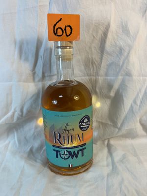 a bottle of liquor with a price tag on it