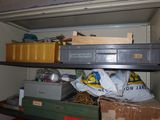 many boxes and boxes on a shelf in a room