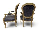 pair of antique chairs with upholstered back and arms